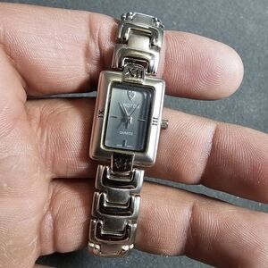 Croton Ladies Quartz Tank Style Watch Silver Tone Working Roman Numerals shows s